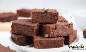 Leave the brownies in the pan for about 5 minutes before transferring them to a wire rack to cool completely. Once completely cooled, slice the brownies into 12 bars and enjoy!