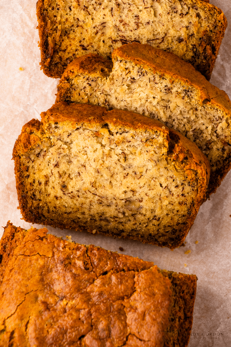 Close-up shot of slices of vegan banana bread with a crunchy crust
