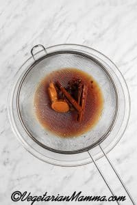 Pour mixture through strainer