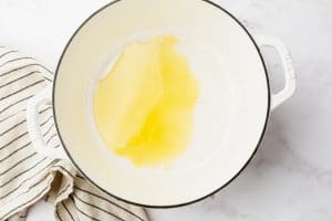 white pot with yellow liquid