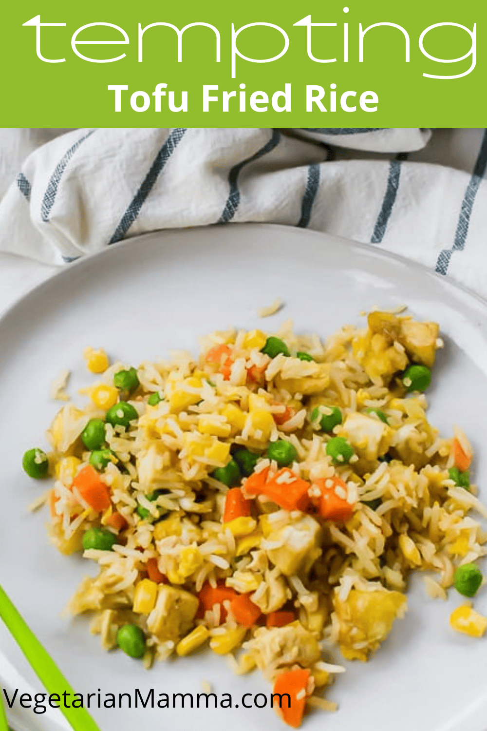 Tofu fried rice is hearty Asian-inspired dish that is filled with hearty protein and veggies. This tofu recipe is fun to make and so flavorful! #friedrice #tofufriedrice #tofurecipes