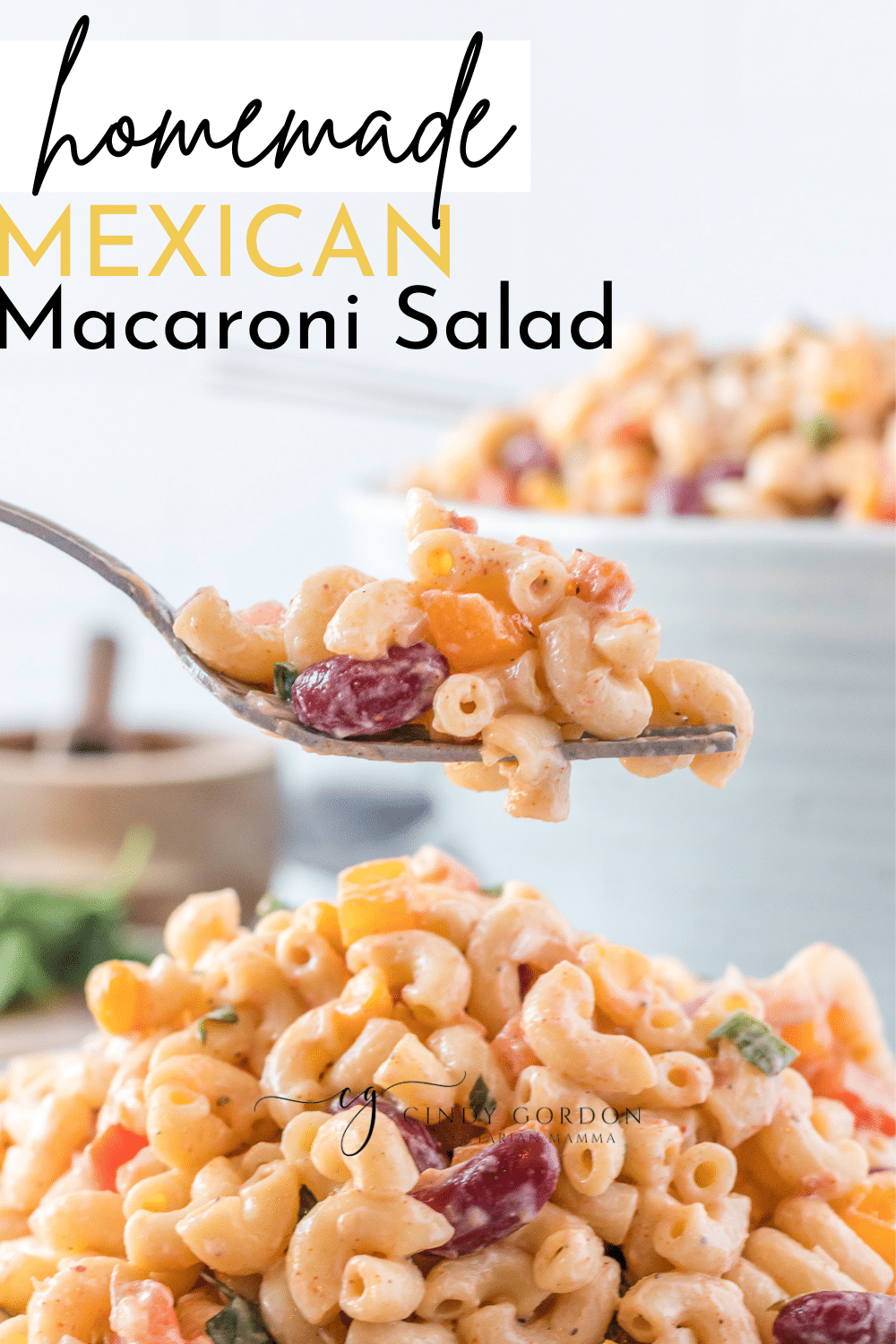 Mexican Macaroni Salad is a crowd pleaser! You will love the crunch and the creaminess this macaroni salad brings to the table! This Mexican Macaroni Salad is packed with colorful and flavorful veggies. | Macaroni Salad | Mexican Recipe
