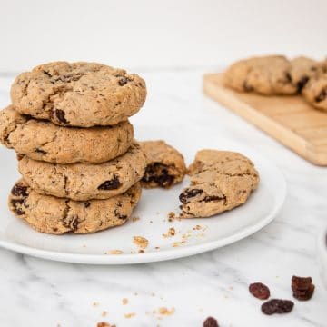 vegan oatmeal raisin cookies - brown fluffy cookies with dark brown raisins