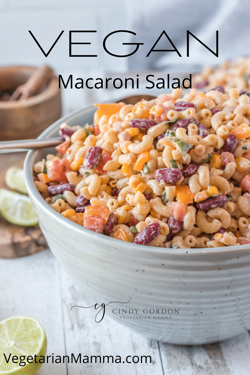 Vegan Macaroni Salad is a crowd pleaser! This vegan macaroni salad is packed with colorful and flavorful veggies. You will love the crunch and the creaminess this macaroni salad brings to the table! Naturally gluten free, dairy free and nut free, just use vegan sour cream to make this dish vegan! | cookout food | Vegan Recipes | Vegan BBQ |