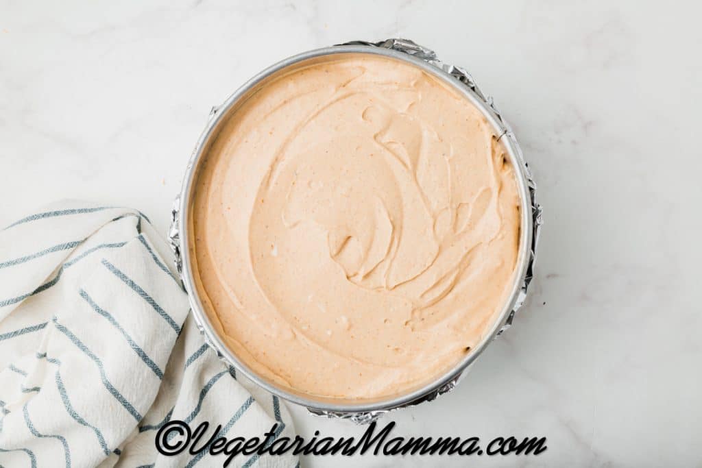 Pour the filling over the cooled crust. Smooth with a spatula.