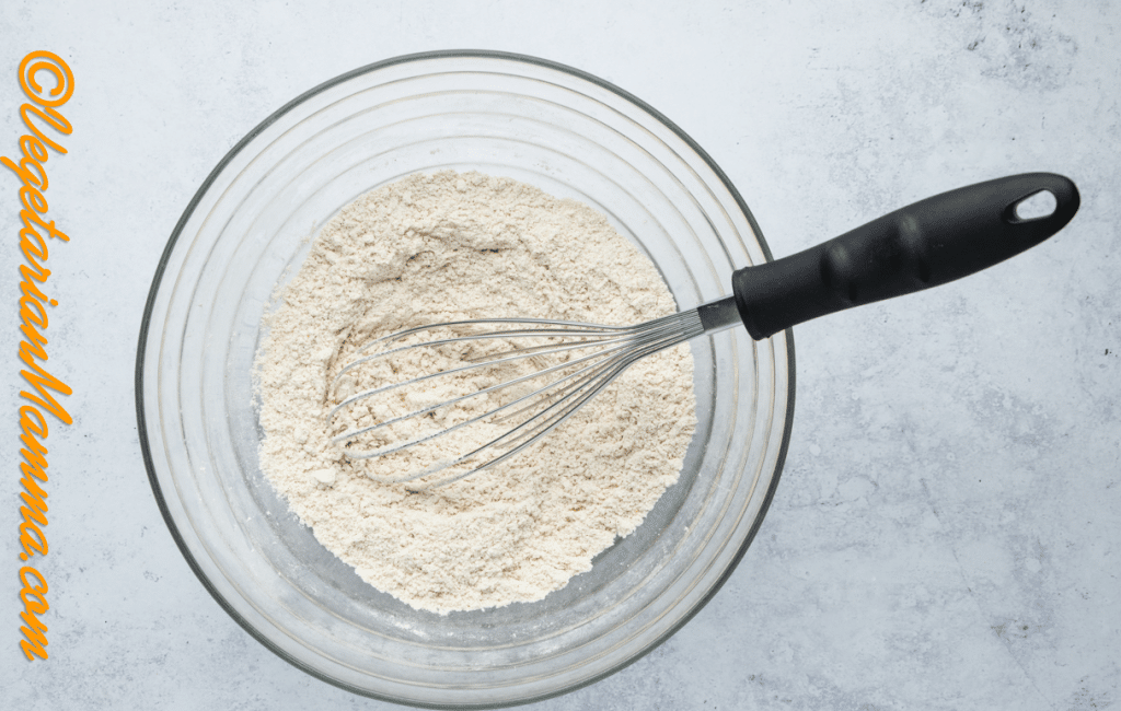 In another bowl, whisk together flour, salt, xanthan gum, baking soda, cinnamon, nutmeg, and ginger.