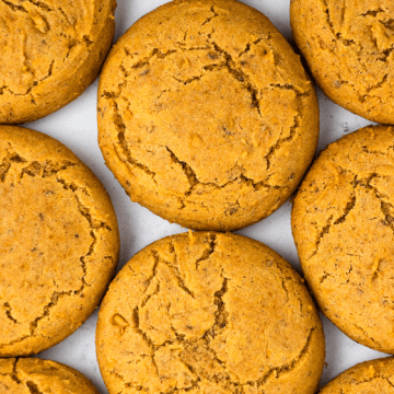 Overhead shot of a grid of fluffy vegan pumpkin cookies