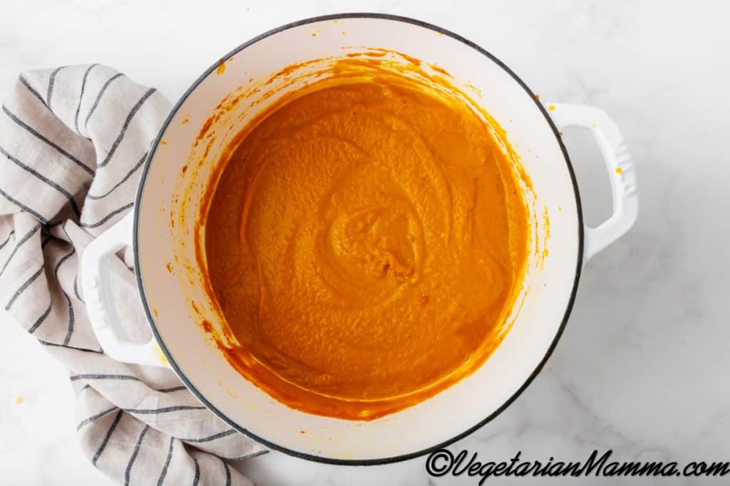 Bring to a boil and then turn down the heat to a simmer. Let simmer for 15 minutes, stirring occasionally, to let the flavors meld together. Use an immersion blender to blend the soup until smooth. Alternatively, you can transfer the soup to a blender to process until smooth.