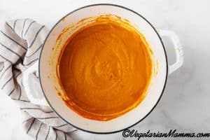 Bring to a boil and then turn down the heat to a simmer. Let simmer for 15 minutes, stirring occasionally, to let the flavors meld together. Use an immersion blender to blend the soup until smooth. Alternatively, you can transfer the soup to a blender to process until smooth.