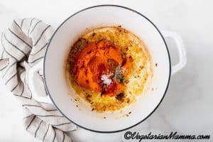 Add the pumpkin puree, salt, ground black pepper, ground cinnamon, nutmeg, and paprika.