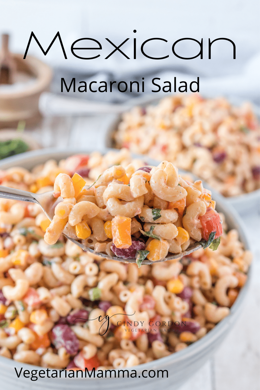 Mexican Macaroni Salad is a crowd pleaser! You will love the crunch and the creaminess this macaroni salad brings to the table! This Mexican Macaroni Salad is packed with colorful and flavorful veggies. | Macaroni Salad | Mexican Recipe