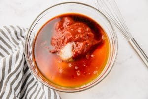 unmixed Sweet and Spicy Sriracha Sauce in a clear bowl