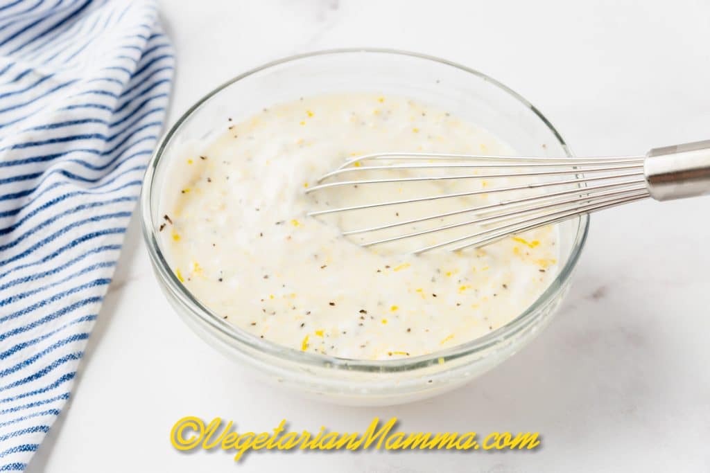 Whisk until combined and the garlic is evenly distributed.