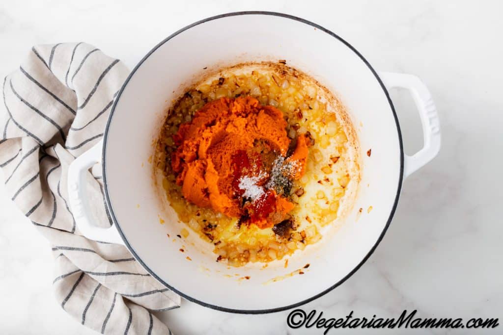 Add the pumpkin puree, salt, ground black pepper, ground cinnamon, nutmeg and paprika.