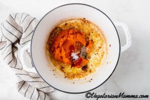 Add the pumpkin puree, salt, ground black pepper, ground cinnamon, nutmeg and paprika.