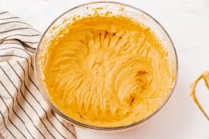 Pumpkin cream cheese dip after mixing with a hand mixer.
