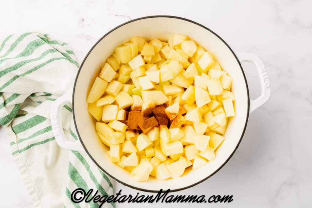 Place the apples in a large saucepan with the water, lemon juice, and ground cinnamon. Stir to combine.