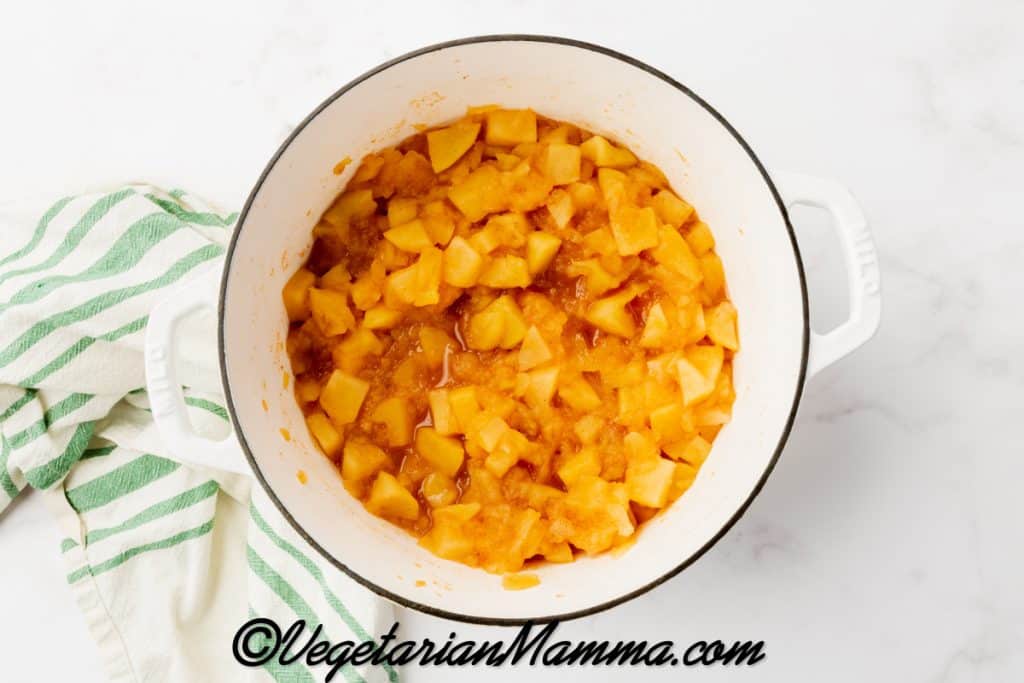 Let simmer for 30 minutes, stirring occasionally, until the apples are very tender and start to break down.