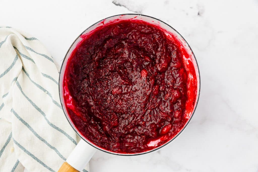 cranberry jam filling in a small saucepan.