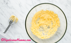 Beat butter and vanilla extract with an electric hand mixer until smooth and creamy.