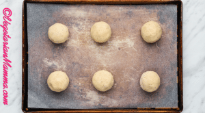 Put the dough balls on the lined baking sheets, and bake for 10 to 12 minutes until the edges are set but the center is still soft