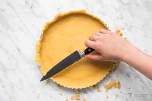 How to trim the edges of crust from a tart pan