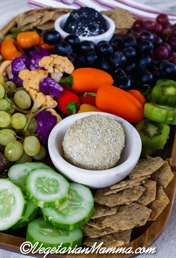 Vegetarian Charcuterie boardw with cheese ball and assortment of fruits and veggies