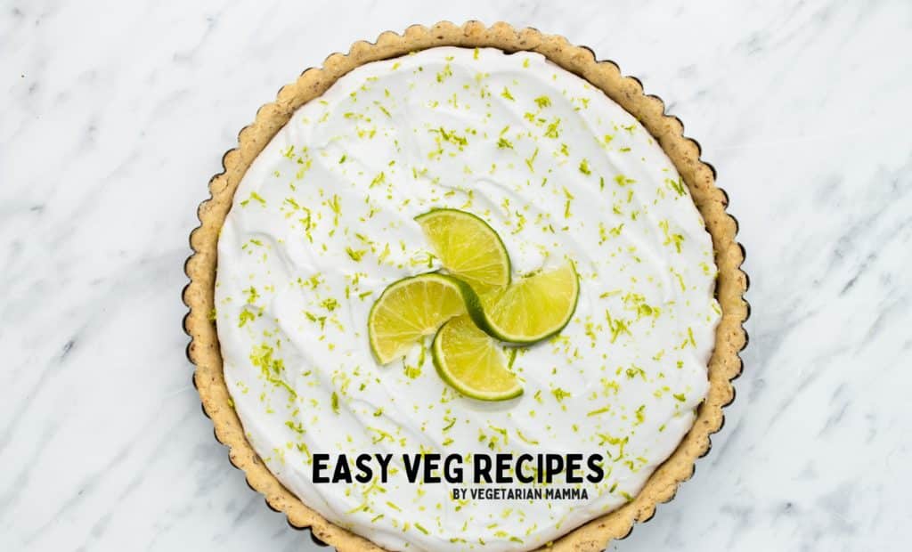 top down view of a whole key lime pie in a tart crust.