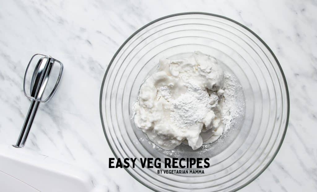 coconut cream and powdered sugar in a bowl.