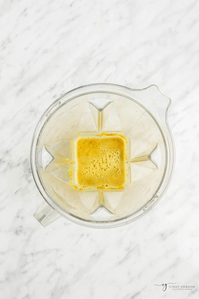 blended wellness shot in a blender, viewed from overhead