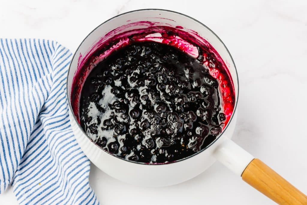 cooked blueberries in a small saucepan