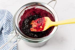 blueberry sauce, pressed through a mesh strainer.