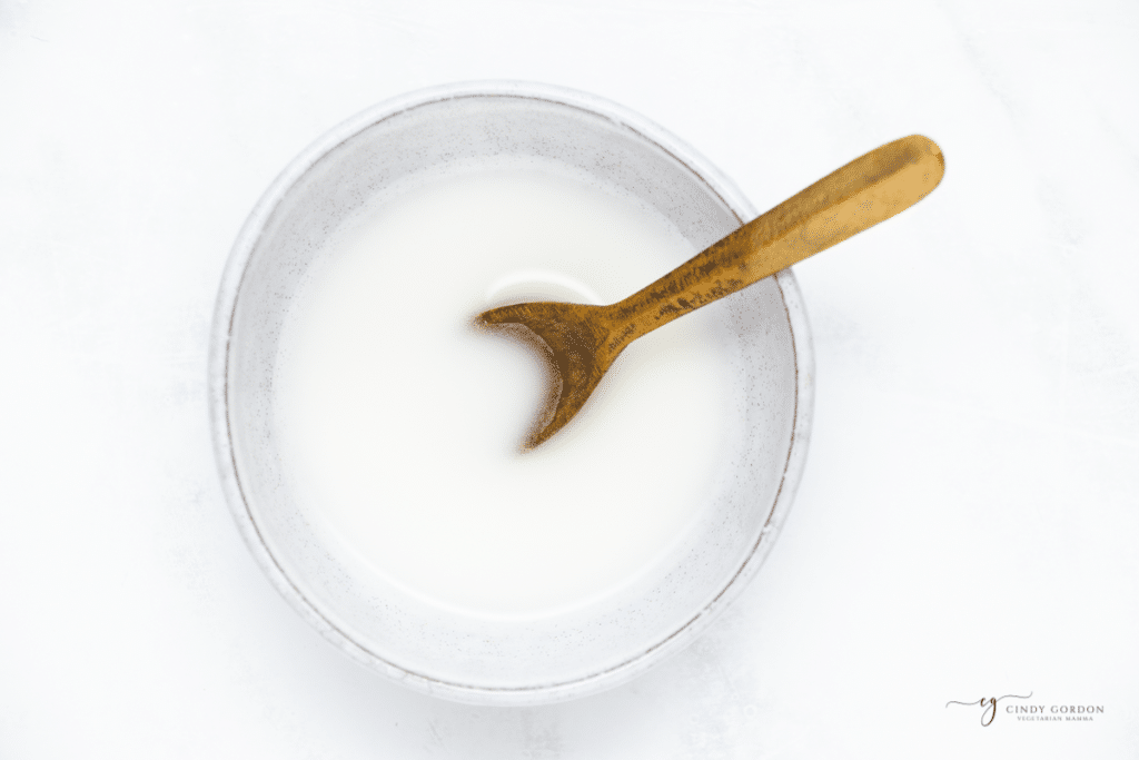a corn starch slurry in a small bowl.