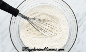In a large mixing bowl, whisk together the flour, baking powder, salt and xanthan gum until well combined.