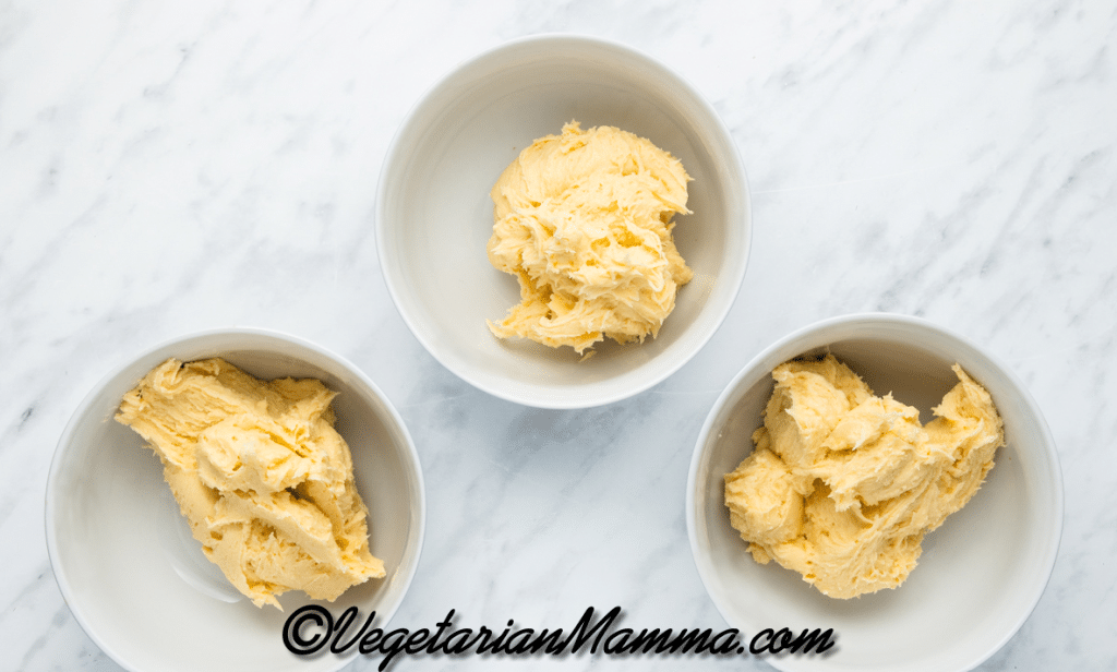 Divide the mixture evenly between three smaller bowls.