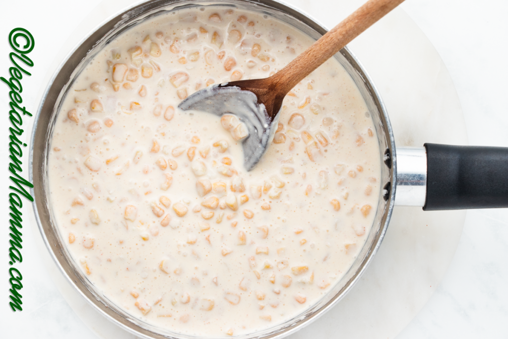 In a pan, add the corn, salt, and cayenne pepper. Stir well.