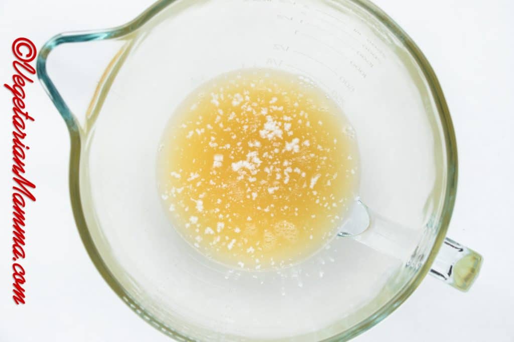 Add the chickpea liquid and cream of tartar to the bowl of an electric stand mixer with the whisk attachment fitted.