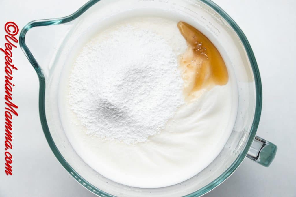 Sift in the powdered sugar and add the vanilla extract.