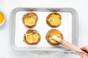 salt baked potatoes brushed with melted butter.