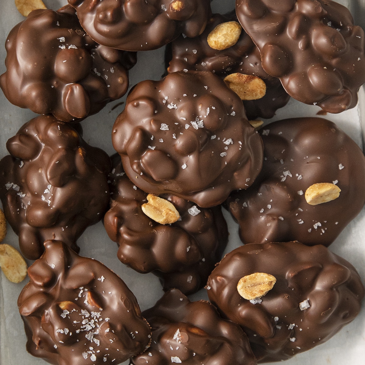 peanut candy clusters with peanuts on top