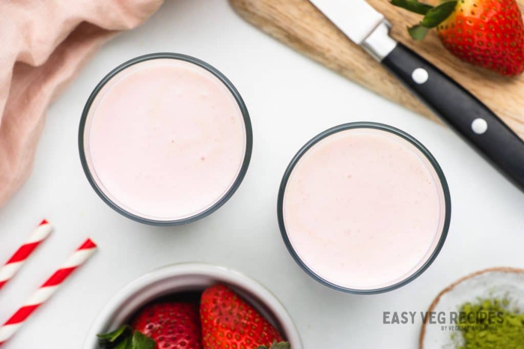 strawberry milk poured over matcha.