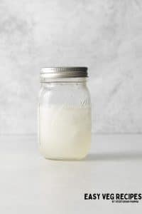 white tea shot on ice, shaken in a glass canning jar
