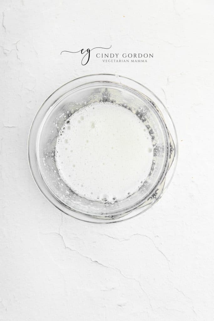 egg whites and sugar cooked to dissolve the sugar.