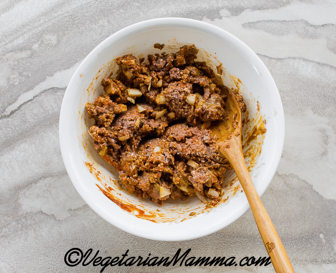 All ingredients are mixed thoroughly in the white bowl.