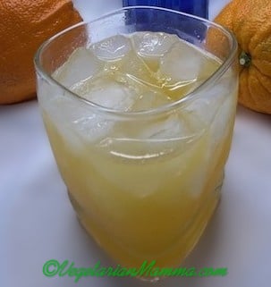 A glass of ice filled with OO7.