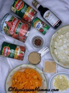 all the ingredients are displayed in cans or bowls.