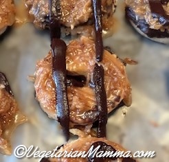 Gluten-free Caramel Delite close up on a tray with chocolate stripes. 