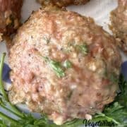 Close up of an Impossible Italian Meatball with some parsley