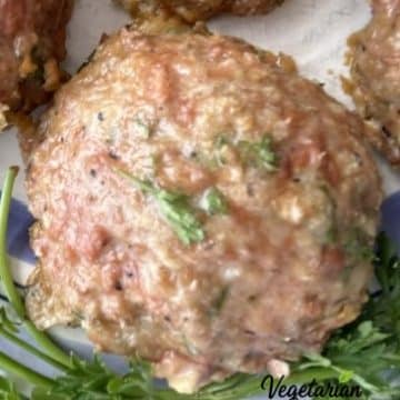 Close up of an Impossible Italian Meatball with some parsley