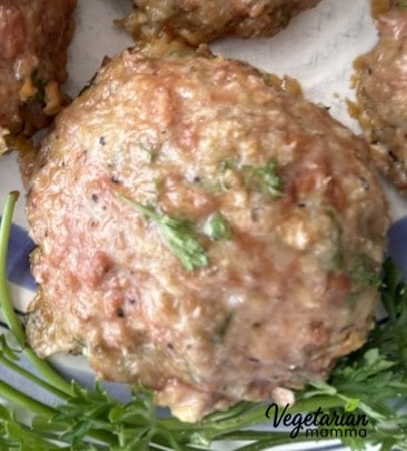 Close up of an Impossible Italian Meatball with some parsley